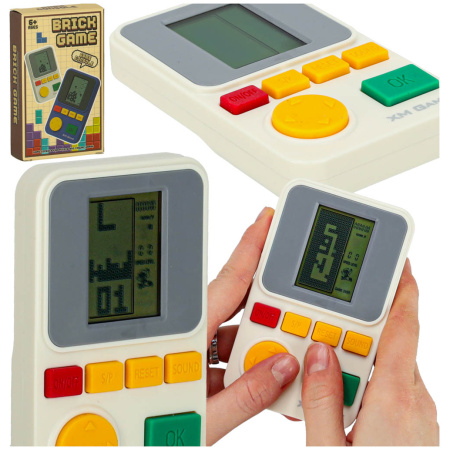 Gra-elektroniczna-zrecznosciowa-konsola-przenosna-biala-163475 Elektroninių arkadinių žaidimų nešiojamoji konsolė balta